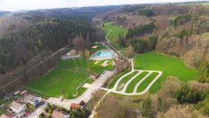 an aerial view of a park with a tennis court at Landgasthof Falken in Niederaltingen