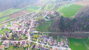 an aerial view of a town with houses and trees at Landgasthof Falken in Niederaltingen