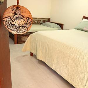 Кровать или кровати в номере Recanto Abayomi
