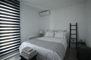 A bed or beds in a room at Leoforos 28is Oktovriou