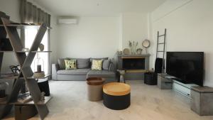 A television and/or entertainment centre at Leoforos 28is Oktovriou