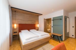 Postel nebo postele na pokoji v ubytování Hotel SCHNEIDER