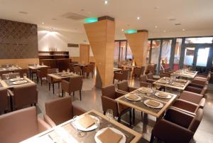 Restauracja lub miejsce do jedzenia w obiekcie Hotel Macami