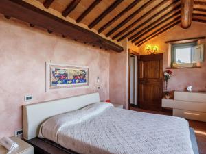 Posteľ alebo postele v izbe v ubytovaní Villa in Cortona with Private Pool