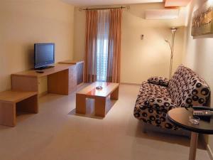 Telewizja i/lub zestaw kina domowego w obiekcie Hotel Macami
