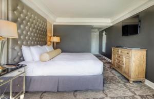 Voodi või voodid majutusasutuse Hotel Ballard toas