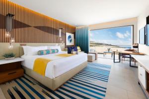 TV a/nebo společenská místnost v ubytování Hard Rock Hotel Los Cabos