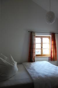 Voodi või voodid majutusasutuse Appartement - Ferienwohnung - FeWo Heuboden toas