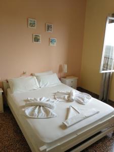 Postel nebo postele na pokoji v ubytování Rooms Apostolis