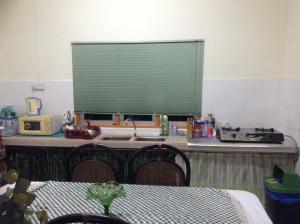 Küche/Küchenzeile in der Unterkunft hb cottage homestay