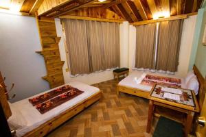 Una cama o camas en una habitación de Sagada Lodging Home