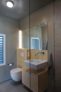 Ένα μπάνιο στο Design Ferienwohnung nienrausch Apartment 1