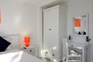 Postel nebo postele na pokoji v ubytování Kata White Villas
