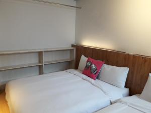 Llit o llits en una habitació de Bo Bo Bear B&B