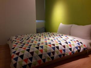 Llit o llits en una habitació de Bo Bo Bear B&B