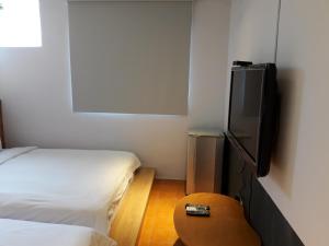 Postel nebo postele na pokoji v ubytování Bo Bo Bear B&B + 11 fotografií