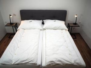 Postel nebo postele na pokoji v ubytování Apartment Loidl Ebensee