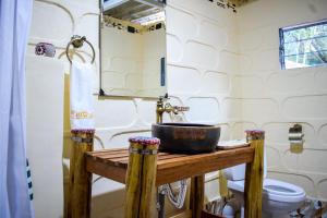Koupelna v ubytování Mara Chui Eco-Resort