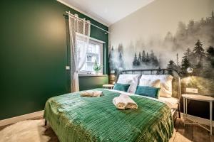 Posteľ alebo postele v izbe v ubytovaní Apartamenty Pod Gondola Świeradów