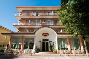 a building with a balcony on top of it at Hotel Belfiore in Misano Adriatico