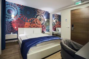 Postel nebo postele na pokoji v ubytování Zepter Hotel Drina Bajina Basta, member of Zepter Hotels
