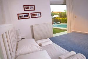 Llit o llits en una habitació de Villa SteMa