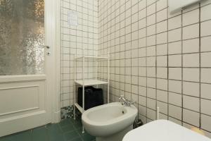 A bathroom at The Best Rent - Stylish loft in the center of Milan