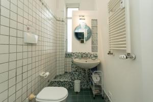 A bathroom at The Best Rent - Stylish loft in the center of Milan