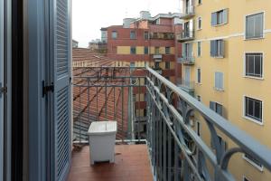 A balcony or terrace at The Best Rent - Stylish loft in the center of Milan