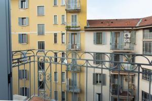 A balcony or terrace at The Best Rent - Stylish loft in the center of Milan