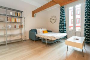 A bed or beds in a room at The Best Rent - Stylish loft in the center of Milan