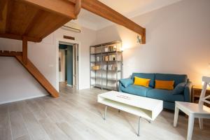 A seating area at The Best Rent - Stylish loft in the center of Milan