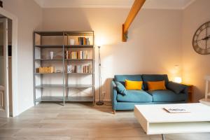 A seating area at The Best Rent - Stylish loft in the center of Milan