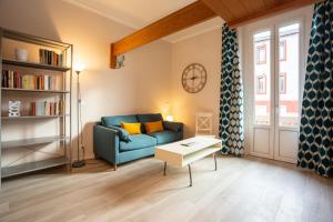 A seating area at The Best Rent - Stylish loft in the center of Milan