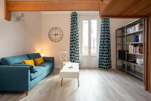 A seating area at The Best Rent - Stylish loft in the center of Milan