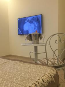 TV a/nebo společenská místnost v ubytování Hotel Victoria