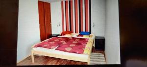 Posteľ alebo postele v izbe v ubytovaní Apartmány ELBA