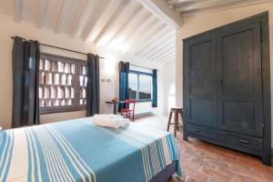A bed or beds in a room at Appartamento Piero
