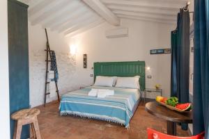 A bed or beds in a room at Appartamento Piero
