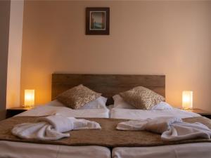 Postel nebo postele na pokoji v ubytování Hotel Pizzeria Istria