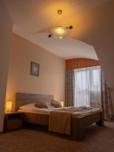 Postel nebo postele na pokoji v ubytování Hotel Pizzeria Istria