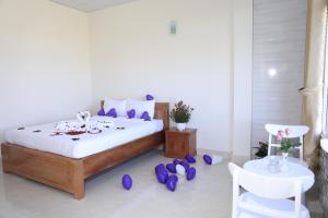 Postel nebo postele na pokoji v ubytování Da Lat Ngoi Sao Viet