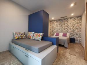 Кровать или кровати в номере Caracola de Cabo Home