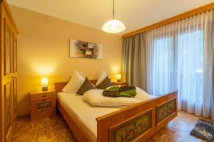 Postel nebo postele na pokoji v ubytování Haus Netzer Anita