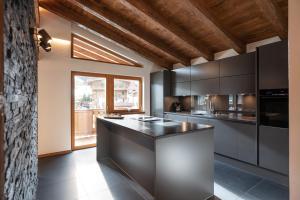 Eldhús eða eldhúskrókur á Alpenchalet "DAHOAM"