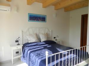 Postel nebo postele na pokoji v ubytování B&B Corte Preare