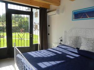 Postel nebo postele na pokoji v ubytování B&B Corte Preare