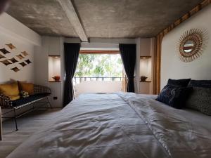 Кровать или кровати в номере Pannana Cha-am