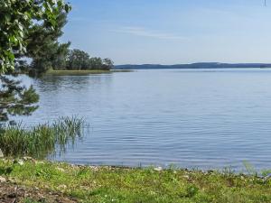 a view of a large body of water at Holiday Home Tuulikannel by Interhome in Hillilä