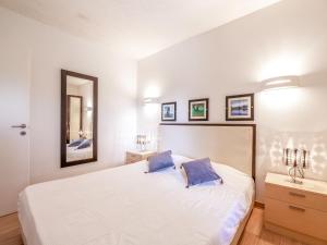 Katil atau katil-katil dalam bilik di Apartment Cala Sultana-3 by Interhome +25 gambar
